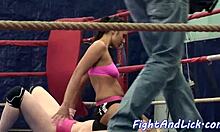 Women with muscles force themselves upon other women and they wrestle in a boxing ring